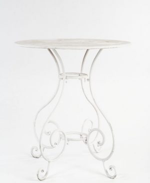 Aged white wrought iron tables garden